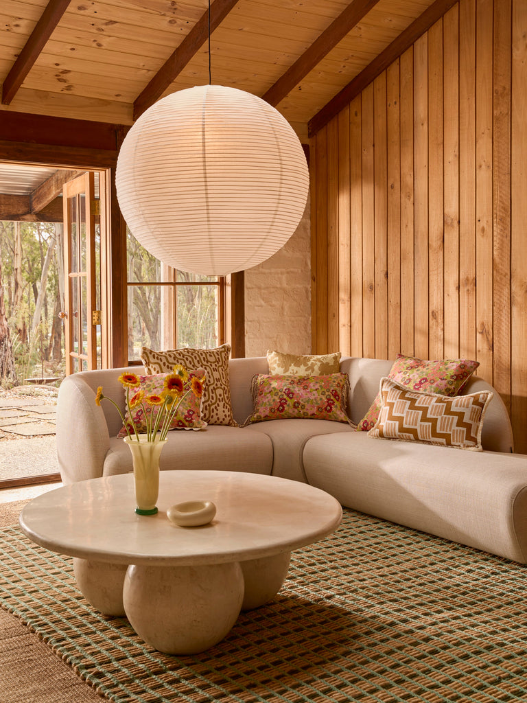 Primrose Sunset 60cm Cushion styled