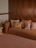 Primrose Sunset 60cm Cushion styled