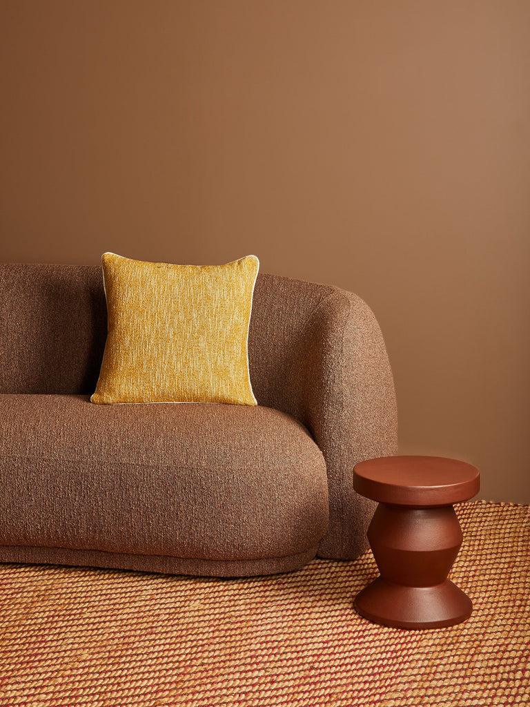 Gem Mustard 50cm Cushion styled