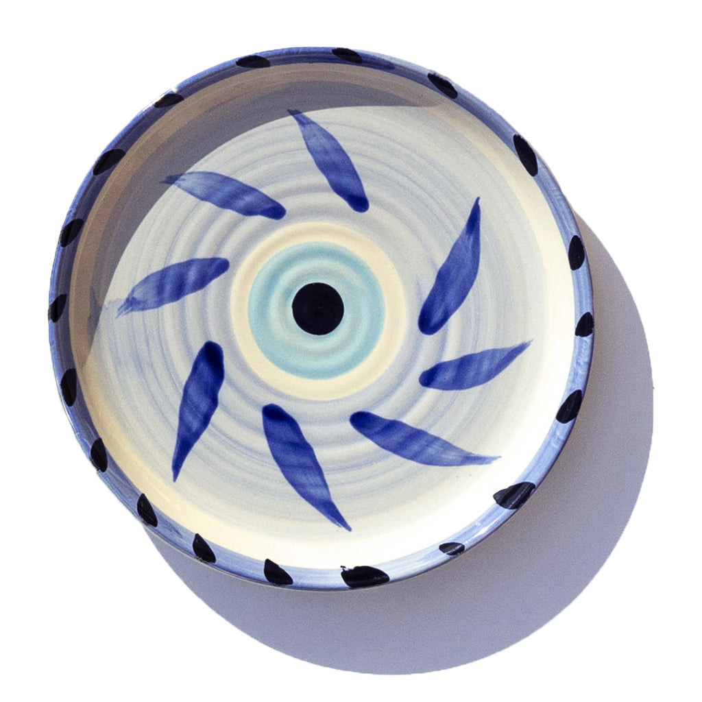 jumbled Robert Gordon hand painted ceramic side plate blue whirlwind design evil eye blue black white