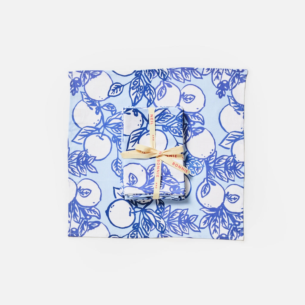 jumbled x bonnie and neil citrone linen napkin set. Hand painted lemons on branches in classic yves klein blue on a soft blue background