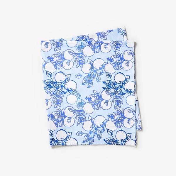 This JUMBLED x Bonnie + Neil tablecloth is perfect for any long lunch. Hand painted lemons on branches, in a classic Yves Klein blue on a soft blue background.